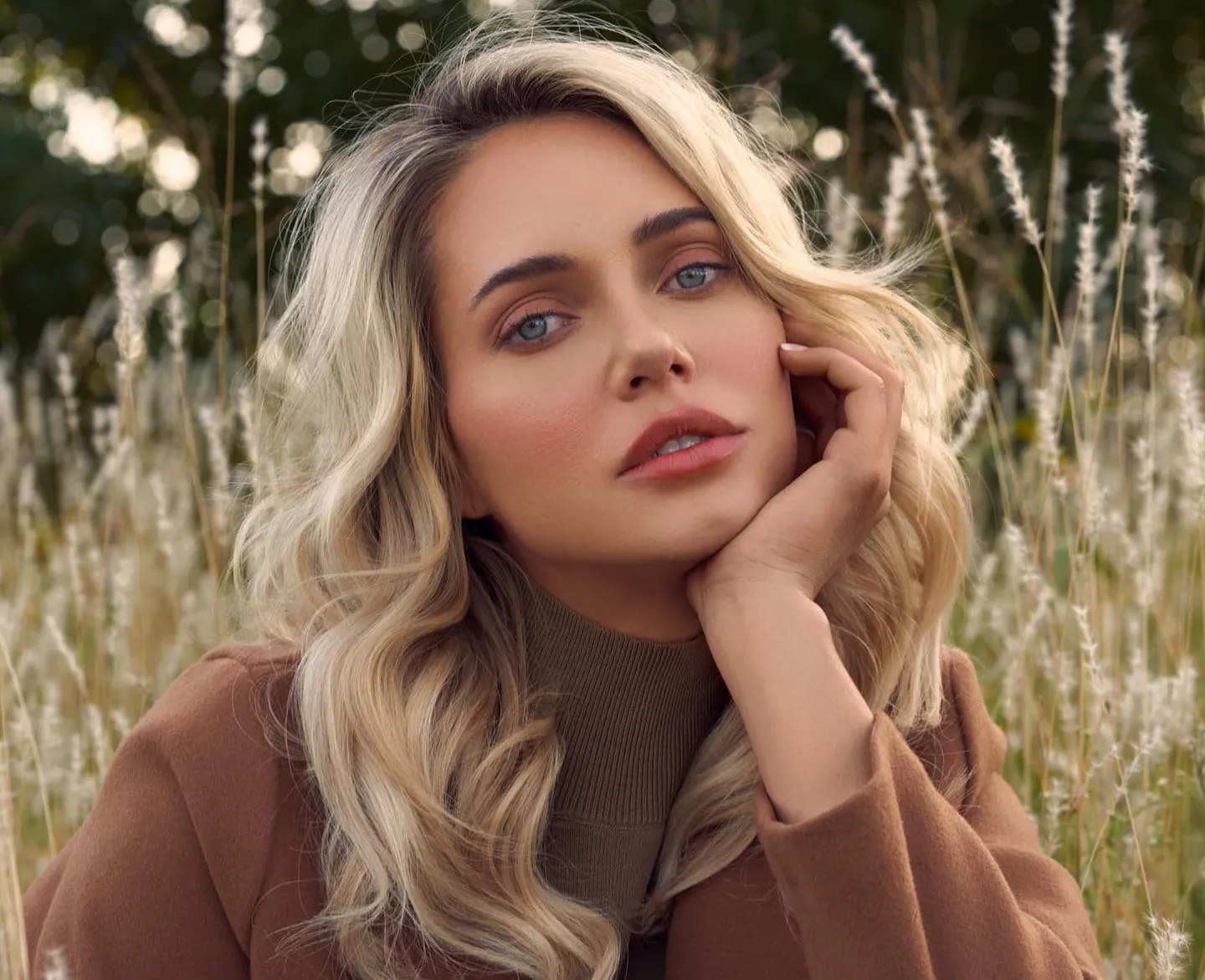 Kevin Murphy hair model posing in a wheat field